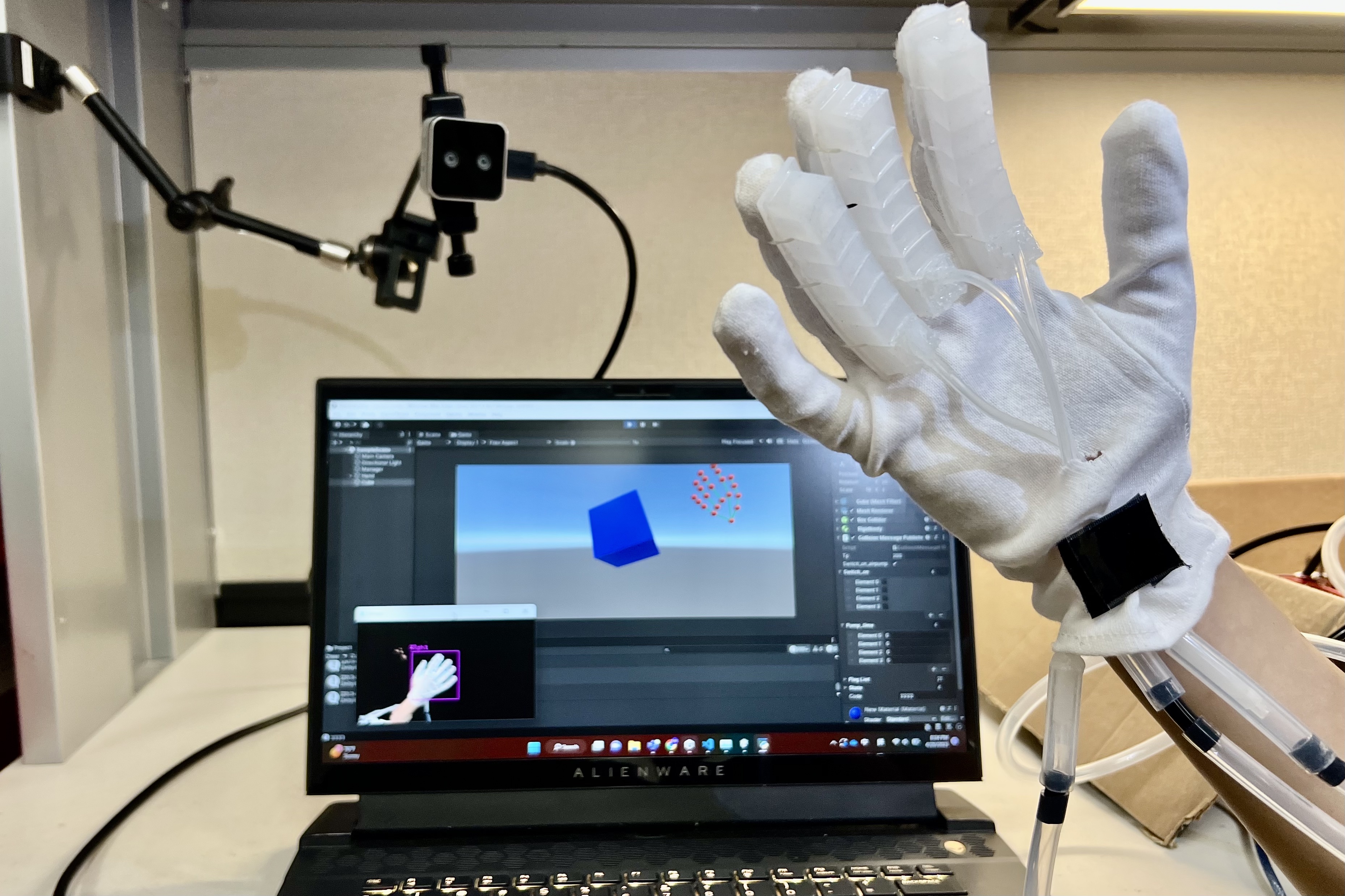 Pneumatic soft haptic glove with mixed-reality technique